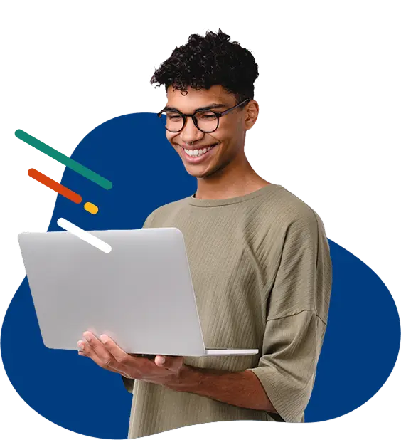 Un hombre feliz sosteniendo una laptop